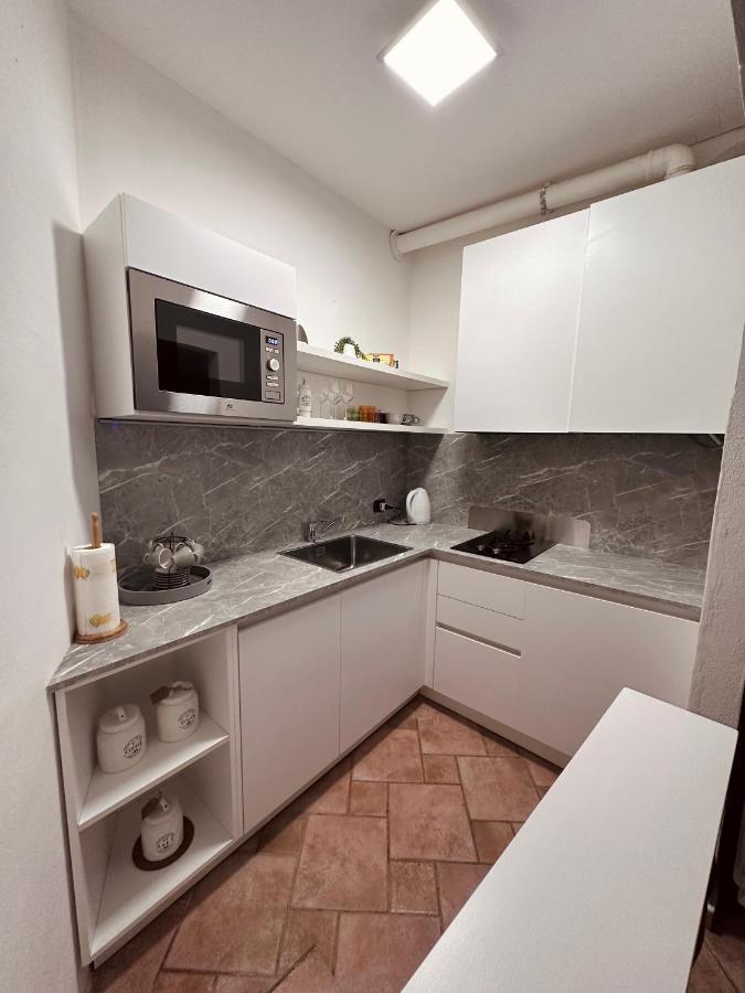 La Casa Del Corso Apartment อาโรนา ภายนอก รูปภาพ